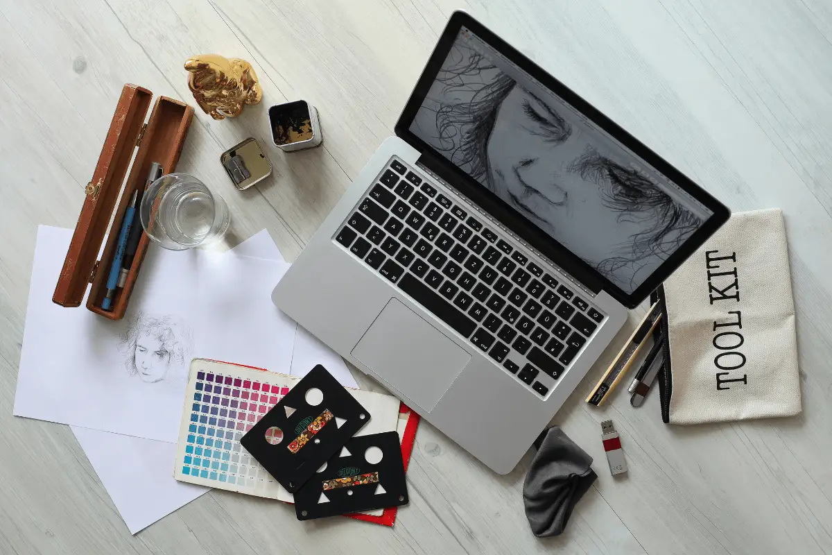 Laptop With Graphic Design Work On It, And